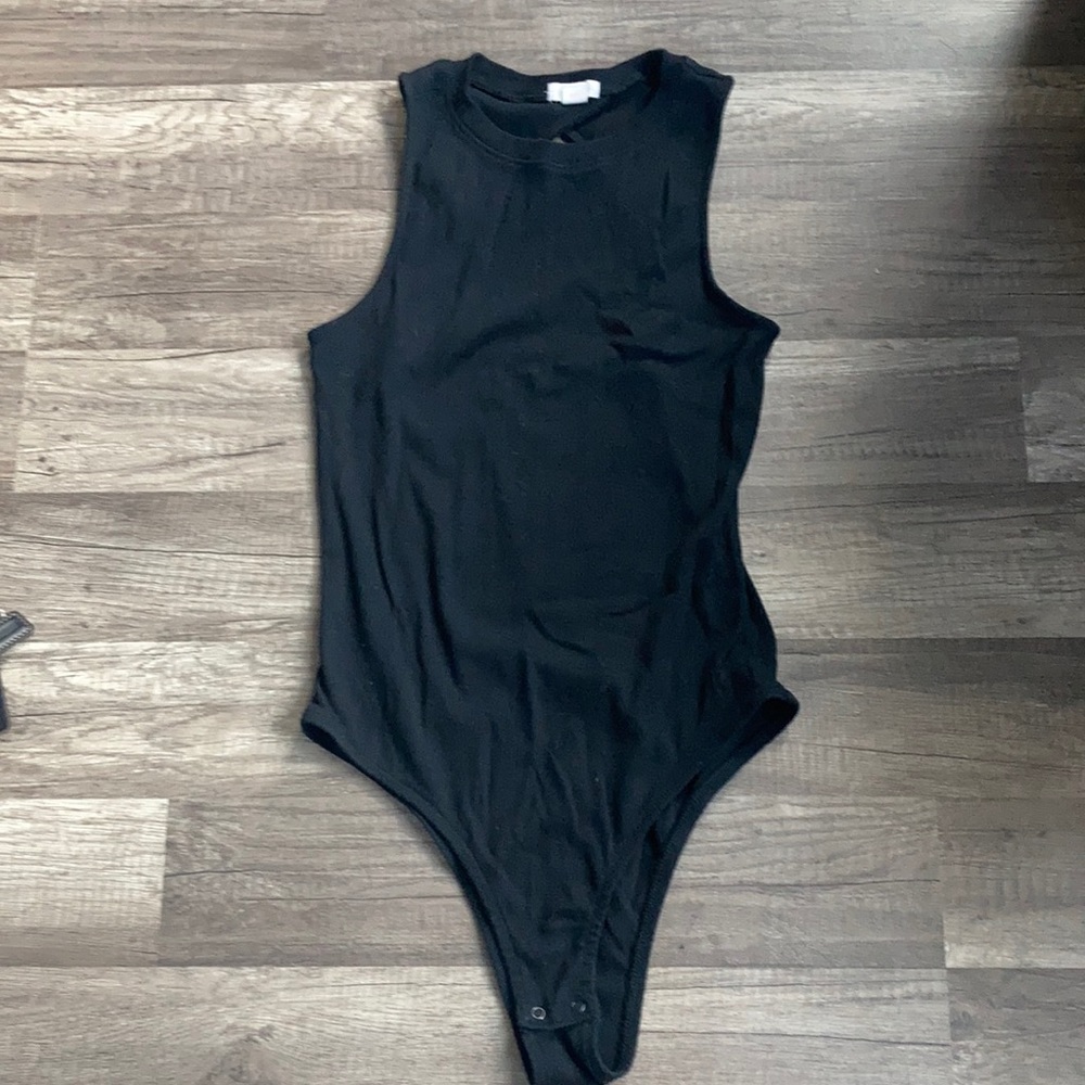 One piece bodysuit top. Size small.